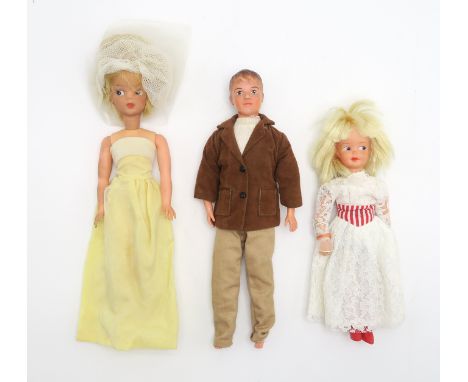 Vintage Sindy, Paul and Patch dolls, with a range of costume accessories, many retaining their original packaging; in additio