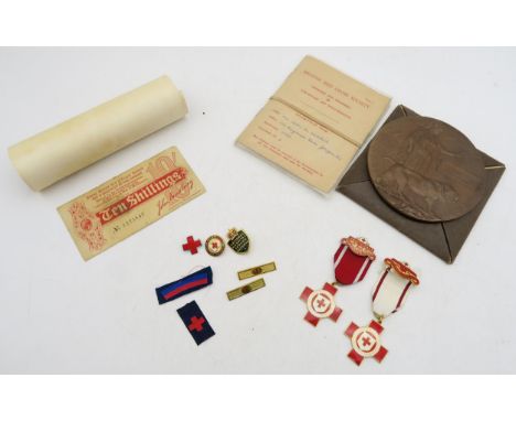 A WW1 death plaque for Pte. James Robertson of the Royal Fusiliers, retaining accompanying scroll and card envelope, together