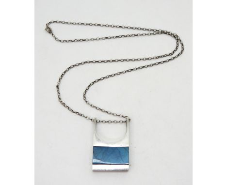 A retro silver and labradorite pendant made in Finland by Valo Koru Oy, date letter V7 for 1974, with London import marks for