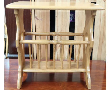 A 20th century blonde ash Ercol magazine rack/side table, 50cm high x 55cm wide x 36cm deep Condition Report:Available upon r