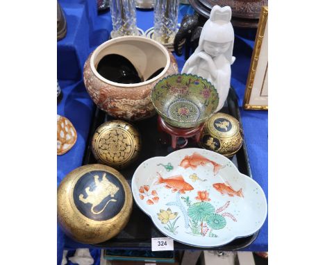 A collection of Indonesian China straits gilded lacquer food bowls, a Chinese plique-a-jour enamel bowl and hardwood stand, a