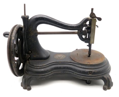 A Victorian Serpentine,&nbsp;Swan Neck or&nbsp;Cat Back&nbsp;hand-crank sewing machine by Jones &amp; Co. of Manchester Condi