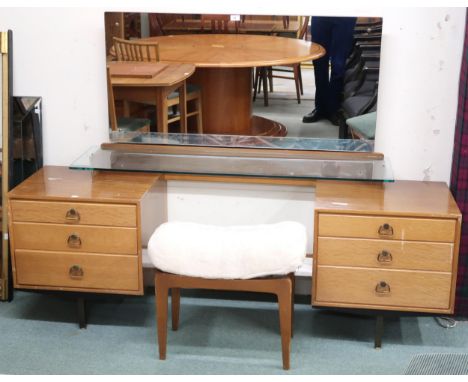 A mid 20th century Lebus dressing table with adjustable mirror over glazed shelf flanked by banks of three drawers, 125cm hig