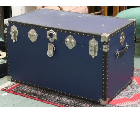 A 20th century metal bound travel trunk, 52cm high x 92cm wide x 51cm deep Condition Report:Available upon request