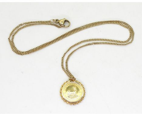 A 1/10 oz Krugerrand,dated 1981, mounted in a 9ct gold fancy pendant mount, together with a 9ct gold chain, weight 9.3gms Con