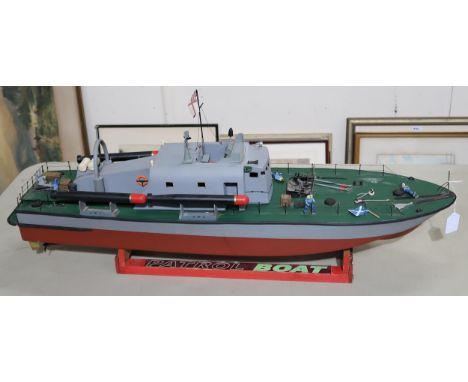 An R/C military "Patrol Boat" pond craft, measuring approx. 90cm from prow to stern Condition Report:Available upon request