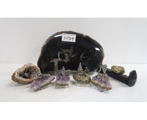 A group of amethyst and Iron pyrites geodes set with metal mining figures etc Condition Report:Available upon request