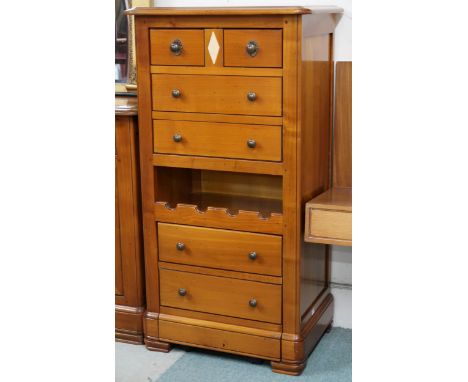 A late 20th century French cherrywood Artcopi drinks cabinet with faux fronted fall front cabinet over open bottle holder ove