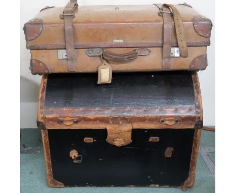 A lot comprising 19th century leather dome topped travel trunk containing assorted linens, 62cm high x 79cm wide x 59cm deep 