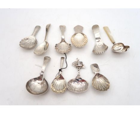 A collection of Georgian and later silver caddy spoons, one possibly by Elizabeth Morley, London 1795, another example by Joh