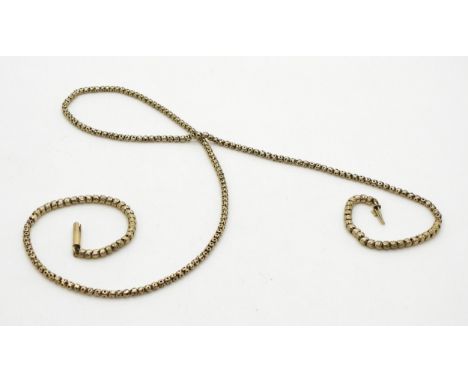A yellow metal fancy link necklace made from a guard chain, length 58cm, weight 8.1gms Condition Report:Available upon reques