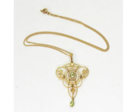 A 9ct gold Edwardian peridot and pearl pendant, length with bail 5cm, weight 3.2gms, together with a 45cm 18ct gold curb chai