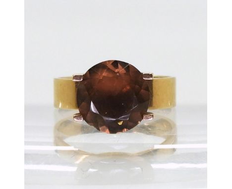 A 14k gold retro smoky quartz ring made by Kupitaan Kulta of Finland, finger size M, weight 3.5gms Condition Report:Available
