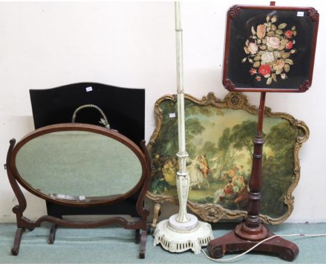 A lot comprising Victorian walnut tapestry pole screen, two assorted fire screens (one def), oval dressing mirror and standar