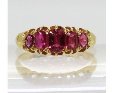 A five stone ruby ring, largest ruby approx 5.3mm x 3.8mm x 2.4mm,&nbsp; hallmarked 18ct, Birmingham 1904, finger size Q1/2, 