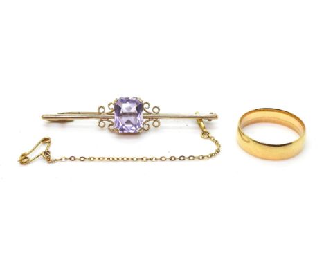 An 18ct gold wedding ring, size P, weight 3.6gms, together with a 9ct gold amethyst brooch weight 3.2gms Condition Report:Ava