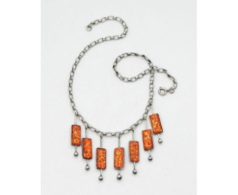 A silver and bright orange enamel modernist necklace, made in Germany, signed Bunge. Length of fringe 3.7cm, length of chain 