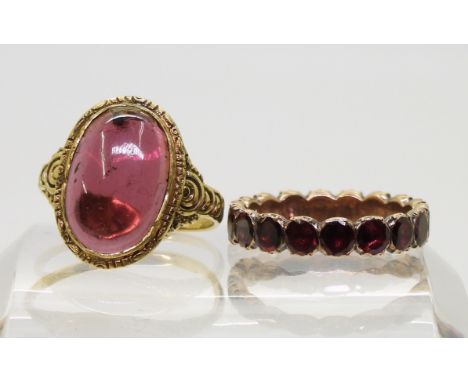 A 14ct gold garnet ring, stamped 585 size approx M, weight 3.8gms, together with a rose-coloured metal foiled back garnet ete