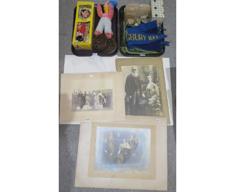 A boxed Pelham Pinocchio Puppet, two felt naval pennants, an applique cigarette silk display, moulded biblical wall plaques, 