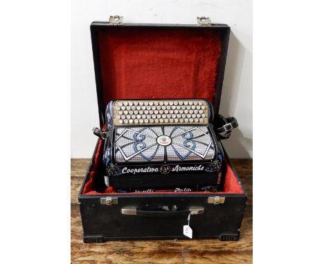 A Cooperitiva Armaniche Vercelli Italia continental chromatic C system accordion with a left hand French 120 bass system and 