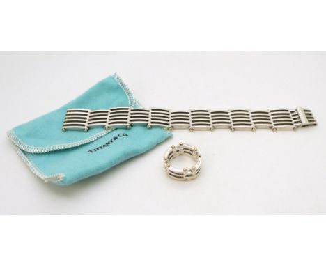A rare 18ct gold and silver Tiffany &amp; Co gate link bracelet, with a matching ring, finger size R, length of bracelet 18.3