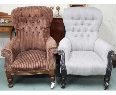 A pair of 19th century button back upholstered armchairs with carved front reliefs on turned front supports, 102cm high x 75c