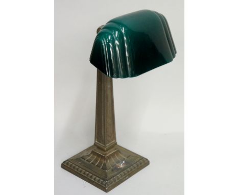 A good Art Deco white metal table lamp of tapered columnar form with spreading square base cast geometric leaves and reel mou