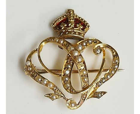 A late 19th Century gold coloured metal and enamel Royal presentation brooch, set seed pearls, 2.5cm wide, 2.5cm high (faults