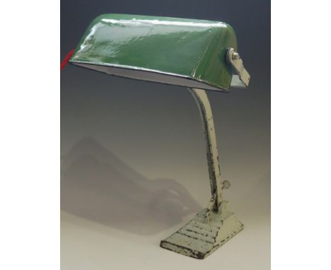 A grey painted cast iron desk lamp with green enamelled shade, the frame moving on a quarter arc, stepped rectangular base, 4