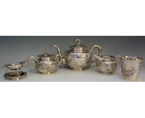 A five piece silver tea service comprising teapot, covered sugar, cream jug, cylindrical beaker and tea strainer on stand, th