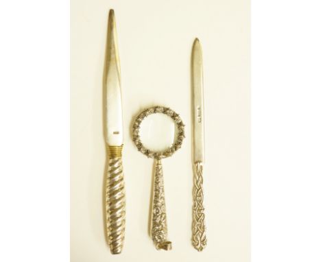 A silver letter opener with interlaced cast Celtic style handle, by Mappin & Webb?, Birmingham 1996; a second letter opener w