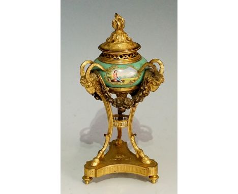 A miniature gilt metal and enamel lidded gueridon, the cover with flambeau finial pierced and cast with stylised leafage, the