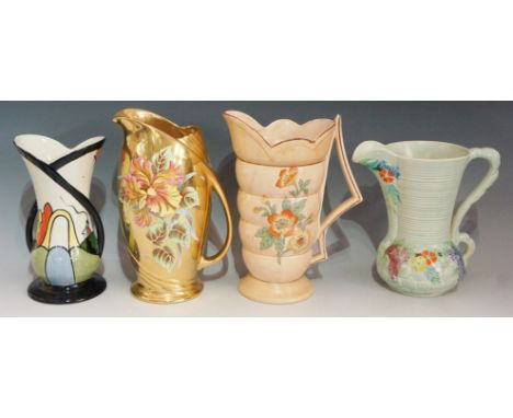 A Royal Winton Grimwades jug transfer printed and painted with flowers on a gold ground, 25cm high; a Carltonware jug moulded