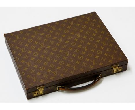 Louis Vuitton - an attaché case, the interior brown leather lined inscribed Louis Vuitton, Paris, Made In France, brass fitti