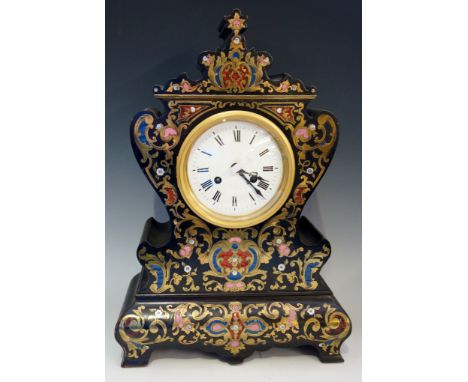 A German ebonised mantel clock of waisted Rococo form, the front inlaid in engraved brass, tortoiseshell, mother of pearl, pi