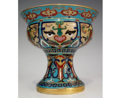 A Chinese cloisonné enamel pedestal goblet of shallow compressed form with spreading neck, waisted stem, the body with six st