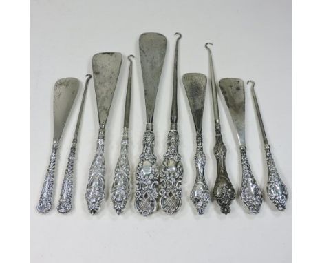 A collection of mainly 19th century silver handled button hooks and shoe horns, various makers and dates (10)