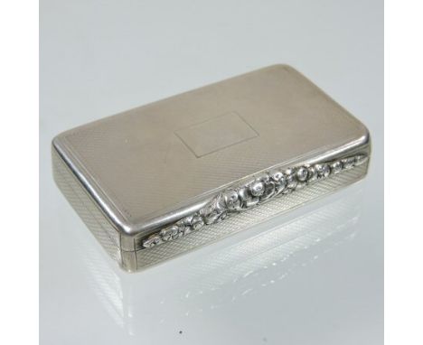 A George III silver snuff box, of plain rectangular shape, with a hinged lid and engine turned decoration, the gilt interior 