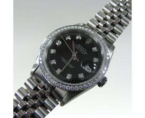 A diamond set Rolex Oyster Perpetual Datejust steel cased chronometer wristwatch, the black dial with date aperture and diamo
