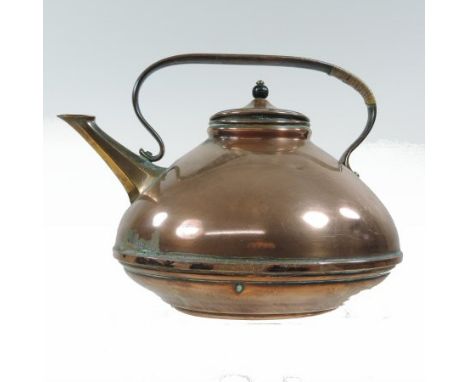 An Arts and Crafts copper kettle, by W. A. S. Benson, of compressed circular shape, with a flattened handle, impressed trowel