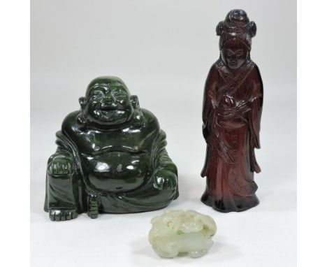 A Chinese carved jade coloured stone figure of a seated Buddha, together with another of a Dog of Fo and a red carved resin f