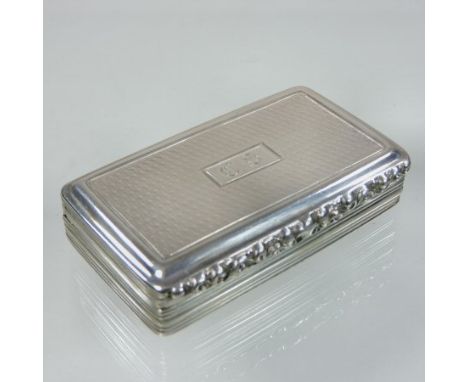 A George III silver snuff box, of hinged rectangular shape, with engine turned decoration, makers marks JL, Birmingham, date 