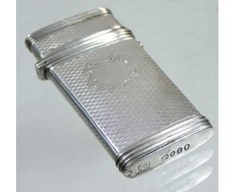 A Victorian silver etui, with engine turned decoration, London 1858, 6cm tall (2)