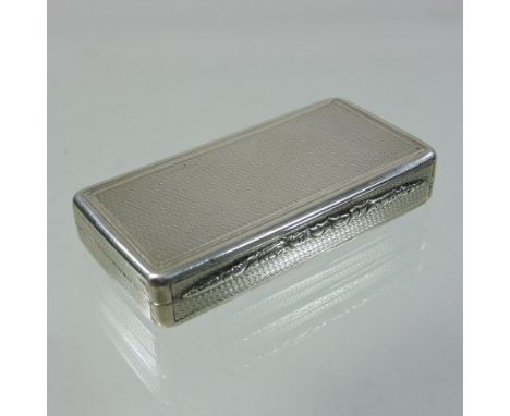 A Victorian silver snuff box, of hinged rectangular shape, with engine turned decoration and a gilt interior, London 1840, 6c