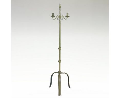 An Arts and Crafts style brass standard lamp, on a tripod base, 139cm high