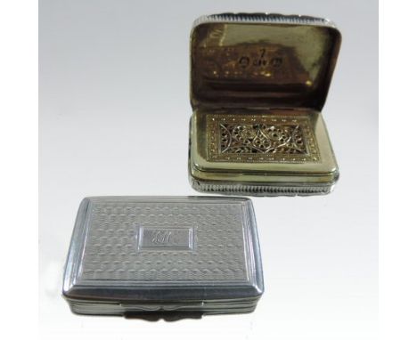 A George IV silver vinaigrette, of hinged rectangular shape, with engine turned decoration, the gilt interior with an ornate 