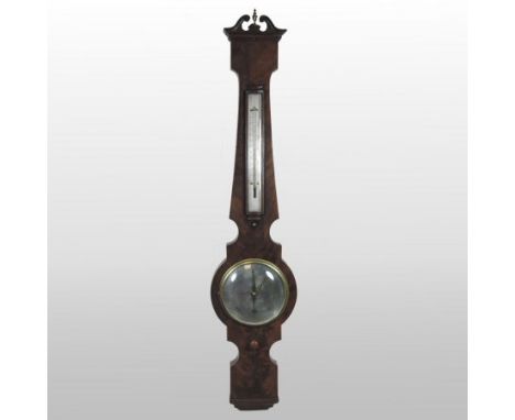 A 19th century flame mahogany cased wheel barometer, the case surmounted by a swan neck pediment, centred by a turned brass f