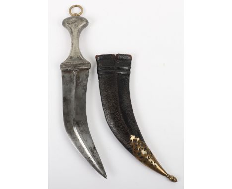 Steel Hilted Jambya (Dagger), housed in leather covered scabbard with brass lower chape mount. Large brass ring mount to the 