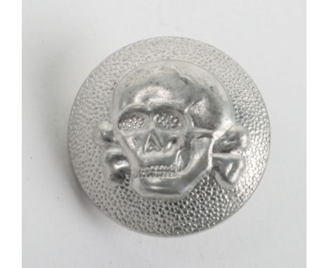 WW2 Style German SS Totenkopf Button, pebbled example with Totenkopf skull to the centre. Reverse with fitting and stamped wi