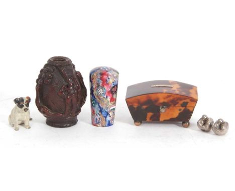 Mixed Lot: A carved early 19th Century coquill nut snuff flask, no stopper, a small antique tortoiseshell box of sarcophogus 